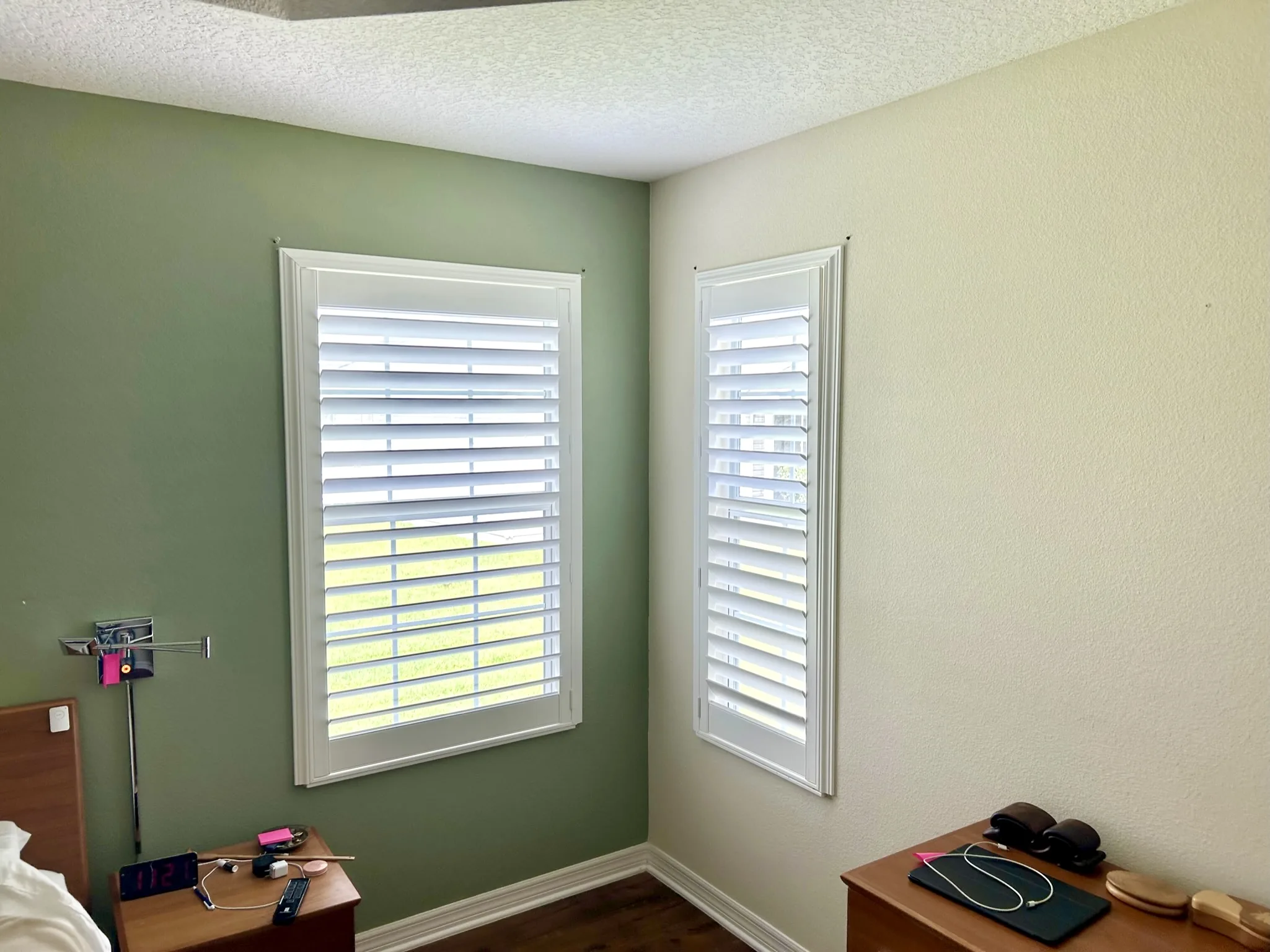 Plantation shutters in a bright Florida bedroom