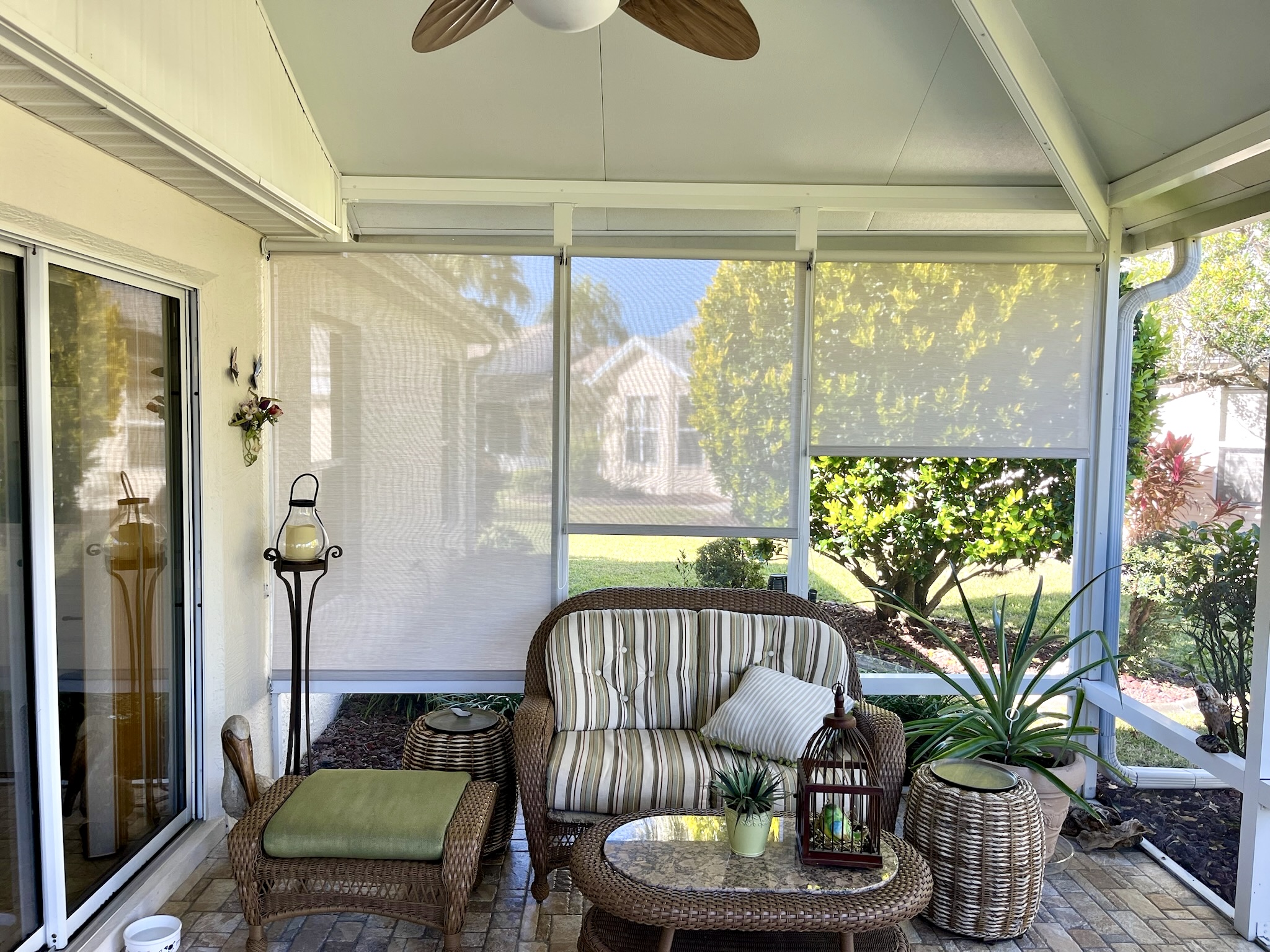 Interior glass lanai roller solar shades