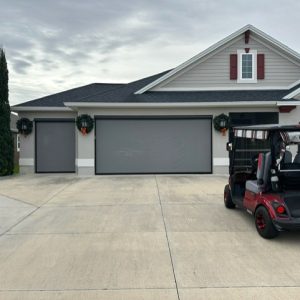 Garage door shade with Christmas wreaths in The Villages